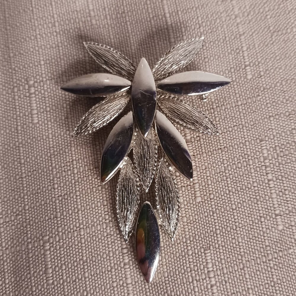 Silver Tone Starburst Brooch
